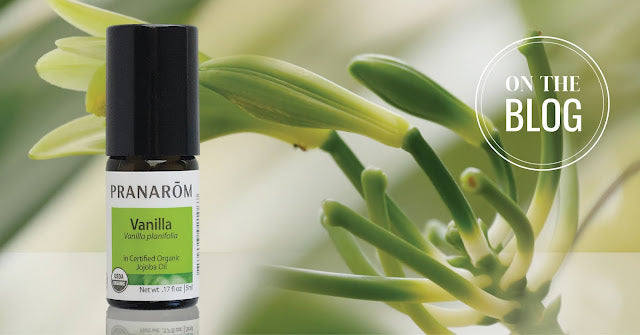 Pranarom Certified Organic Vanilla Essential Oil bottle and plants.