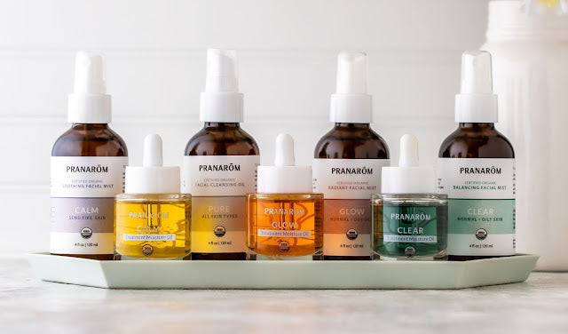 Pranarom Certified Organic Calm Facial Mist, Calm Treatment Oil, Pure Cleansing Oil, Glow Treatment Oil, Glow Facial Mist, Clear Treatment Moisture Oil, and Clear Facial Mist bottles.